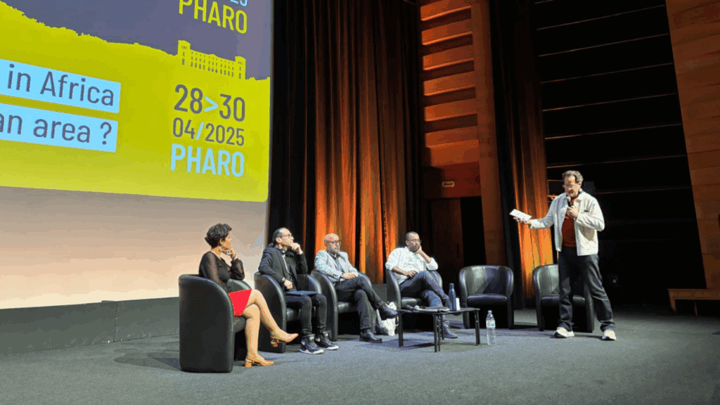 Boris van Westering moderates the session, "Climate and environmental emergency: What responsibilities do journalists have?". He stands on stage with 4 other panels.